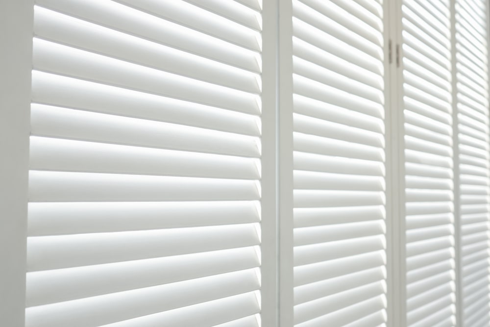 vinyl shutters vs wood shutters